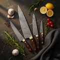 4-Piece Damascus Chef Knife Set Flat Lay