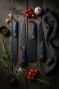 5-Piece Hammered Black Steel Knife Set — Lifestyle Flat Lay