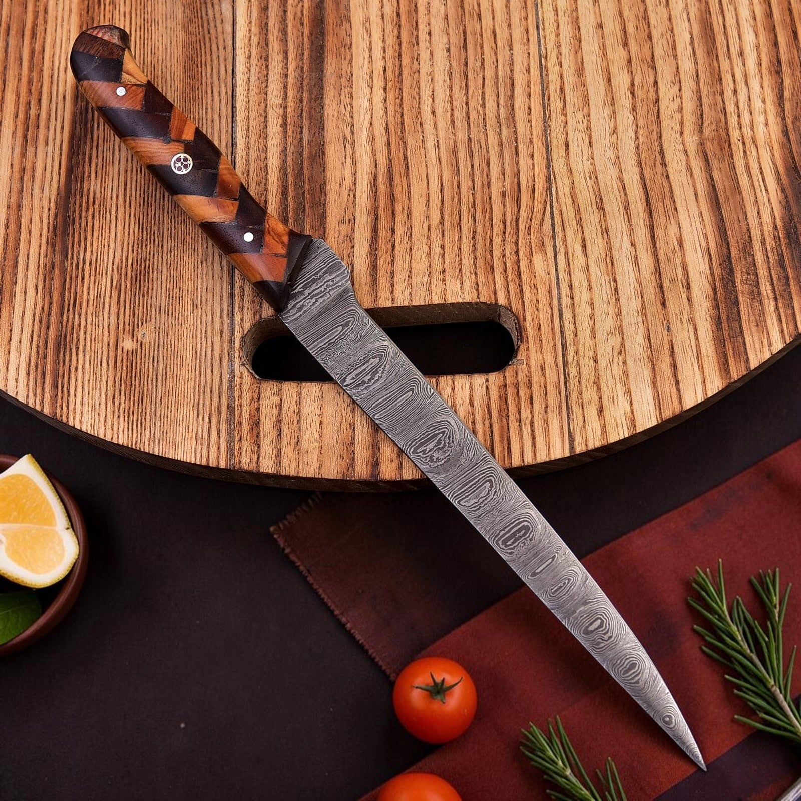 Decorative knife with a wooden handle on a wooden cutting board with vegetables.